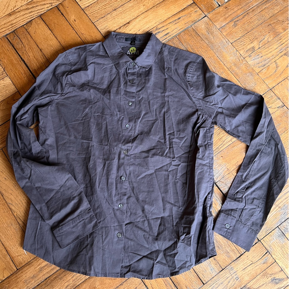 ATM size medium women’s button down. Boxier fit.